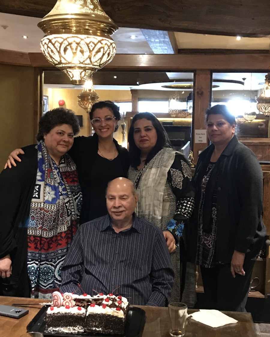 Aslam Hayat with his daughters at his 85th birthday dinner, Vancouver