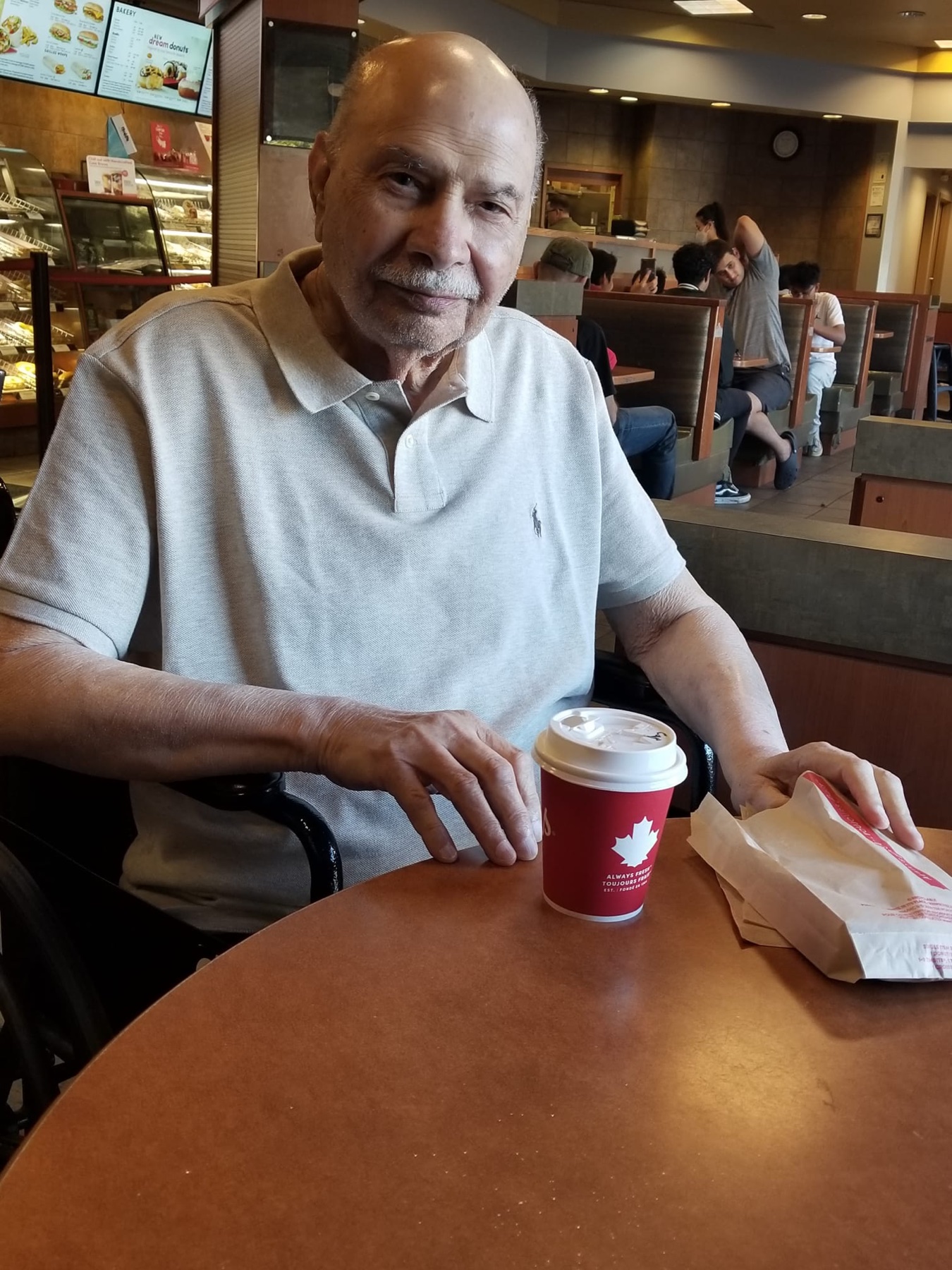 Aslam Hayat at a café in Vancouver
